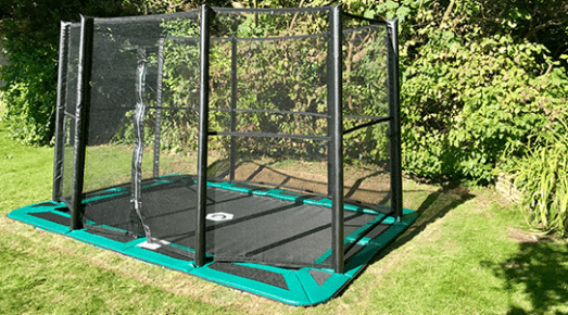 Fully-enclosed green in-ground trampoline