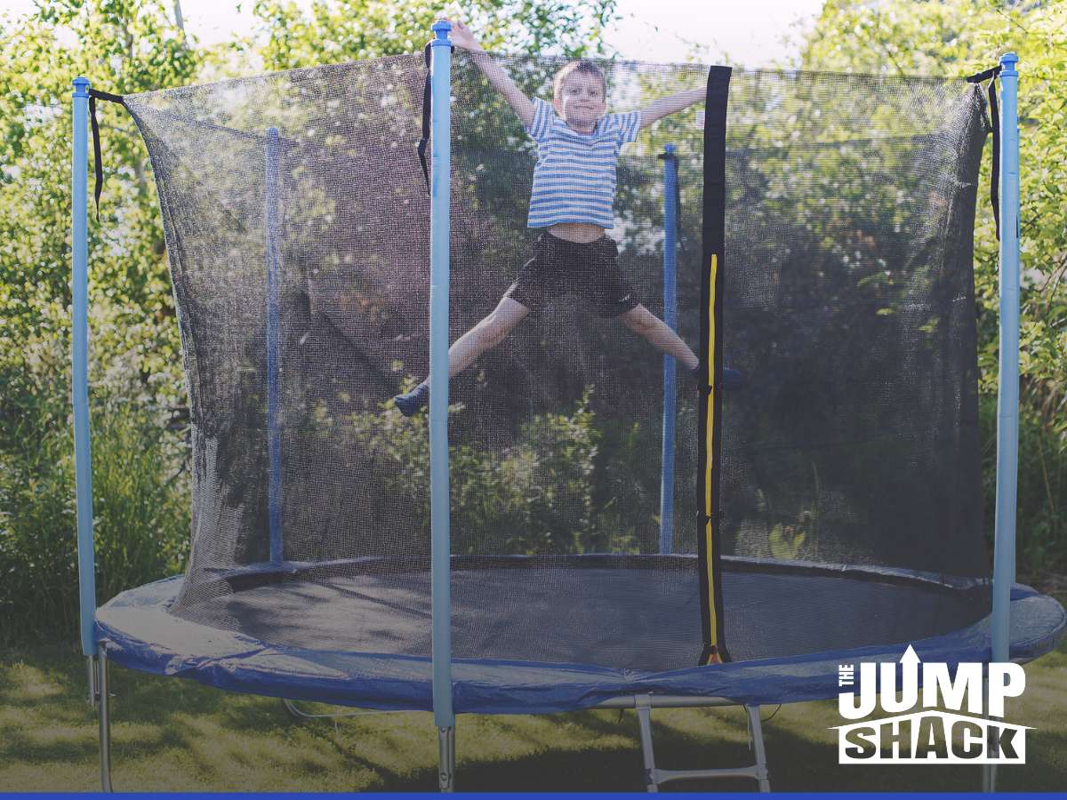 Child safely bouncing inside a trampoline with a secure Trampoline Enclosure by Jump Shack