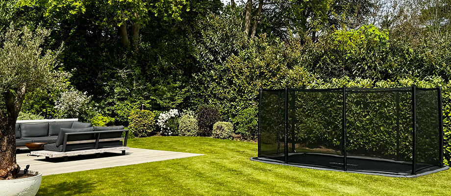 spacious-yards-in-ground-trampolines-img In-ground trampoline blending into a spacious Alabama backyard